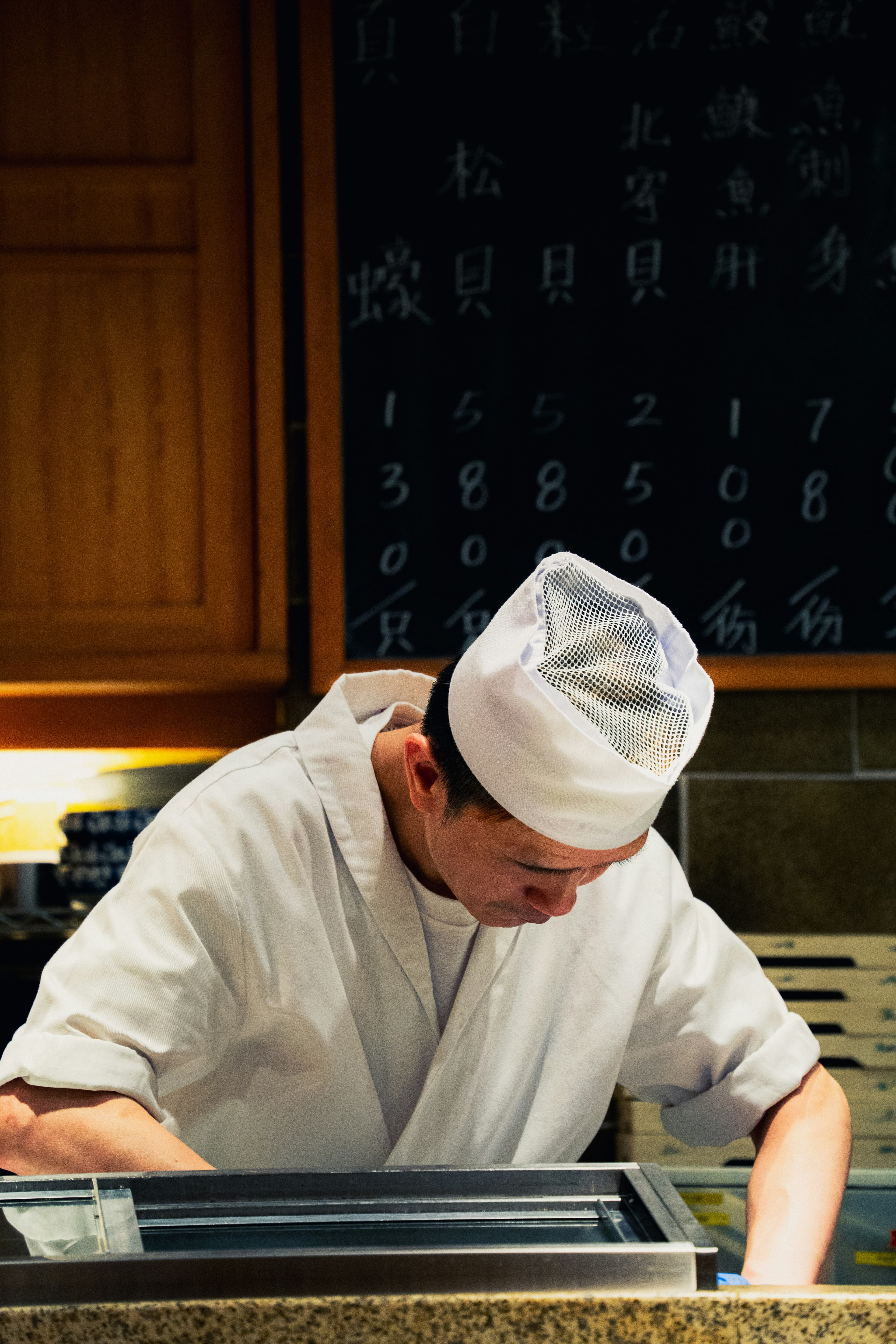 Chef focused on precise preparation
